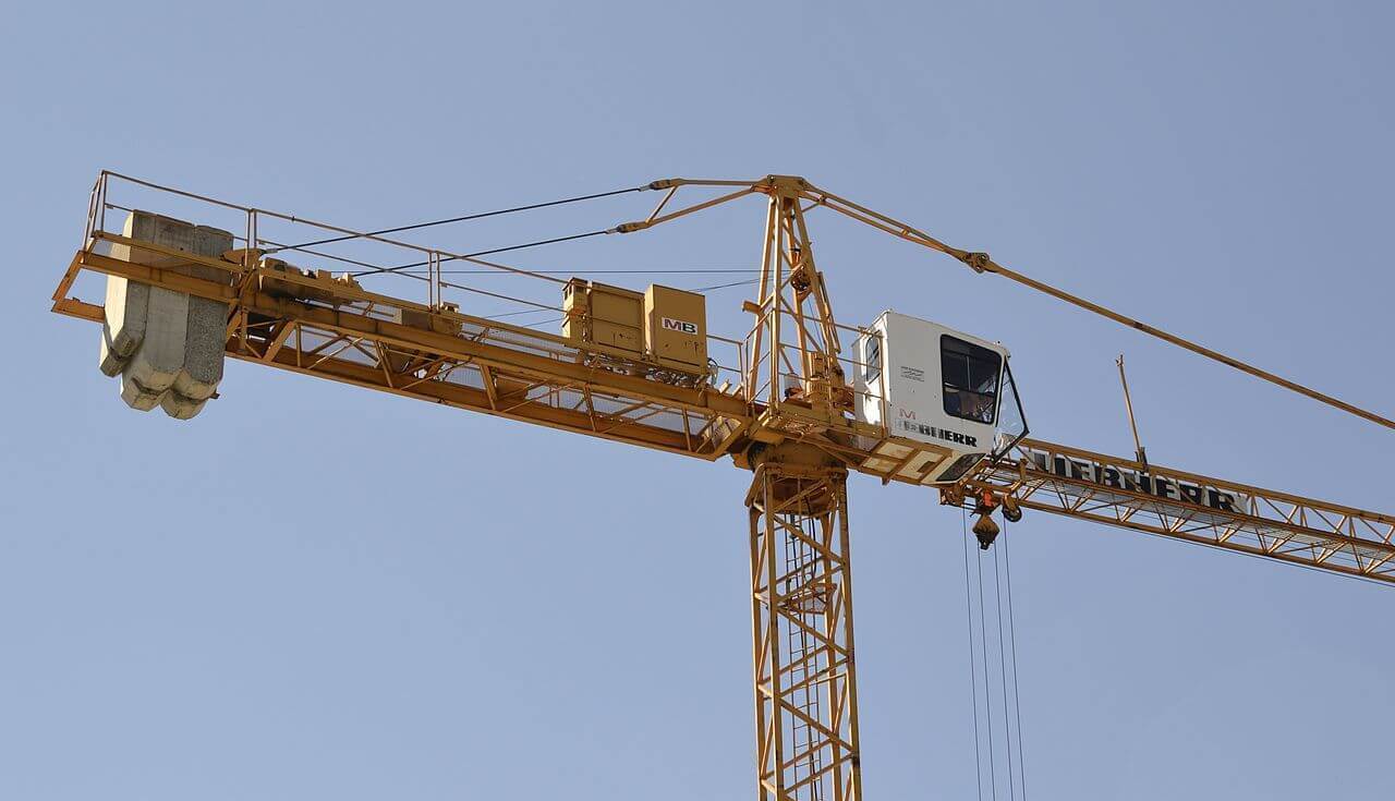 A yellow Liebherr tower crane is an example for a product made in Europe