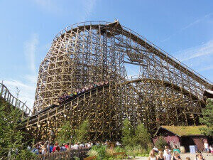The massive wooden structure of the amusement rides first drop hill